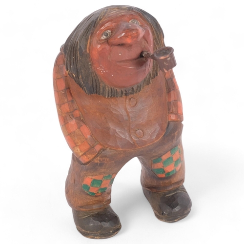 89 - Anton Sveen, Norway, a polychrome carved figure of a troll smoking a pipe, H16.5cm