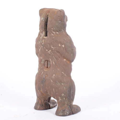 96 - A Vintage cast-iron bear money box, H15cm