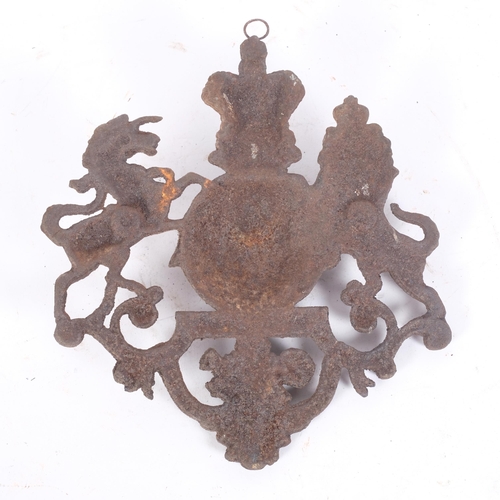 97 - An Antique cast-iron coat of arms, W21cm