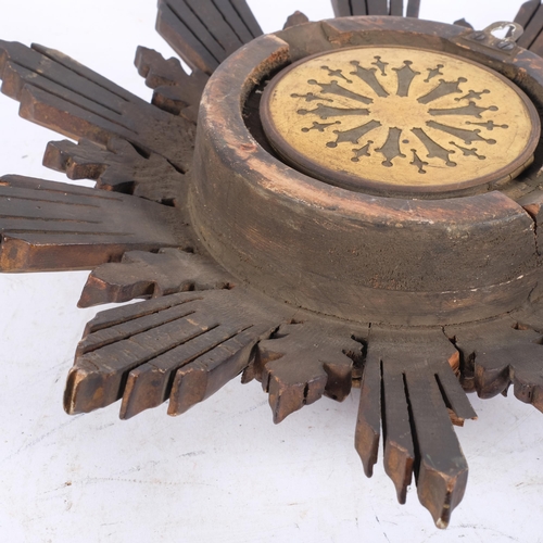 432 - A Vintage carved wood sunburst wall clock, unmarked, diameter approx 42cm