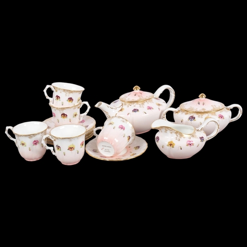 437 - A Vintage Wedgwood porcelain 'Pansy' pattern tea set for 5 people, teapot 10cm