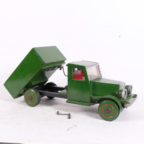 438 - A scratch-built painted pine tipper truck toy, 47cm