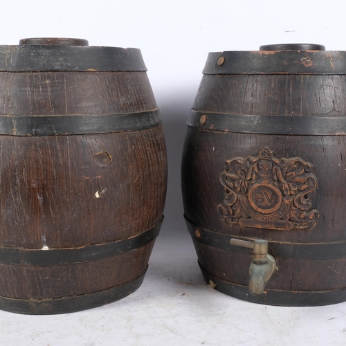 444 - A pair of Gilbey Vintners Sherry barrels, each with brass tap, and wooden logo crest to side, height... 