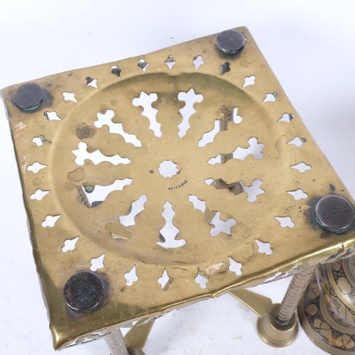 479 - An Antique brass trivet with pierced decoration, a small brass Chinese decorated caddy with lid, H22... 