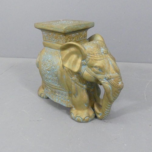 2315 - A painted ceramic elephant design garden seat. Length 46cm, height 41cm, width 20cm.