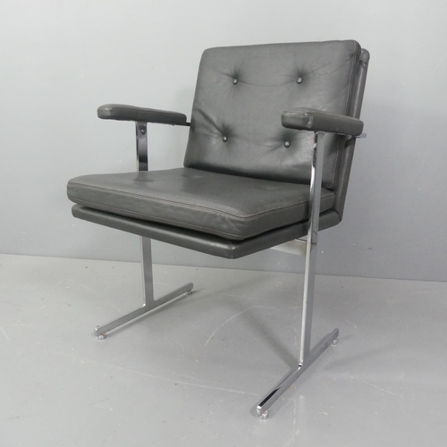 2323 - Robin Day - A mid-century Hille Delphi leather and chrome armchair or desk chair on T shaped legs, w... 