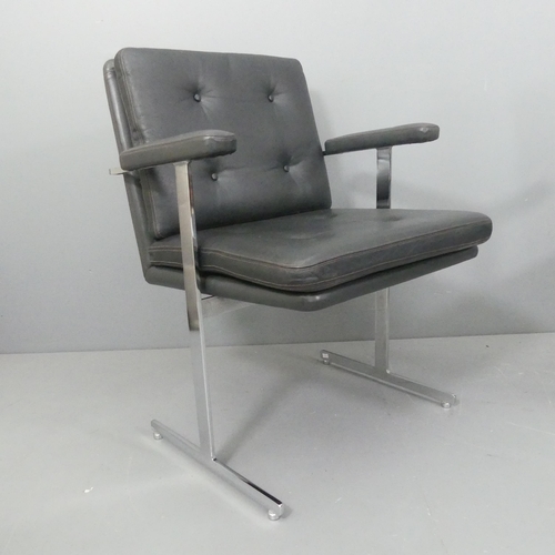 2324 - Robin Day - A mid-century Hille Delphi leather and chrome armchair or desk chair on T shaped legs, w... 