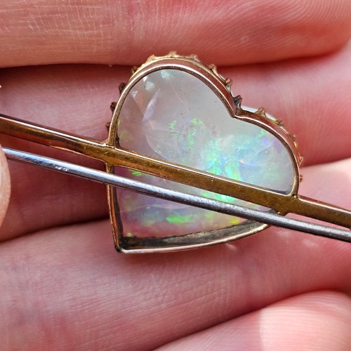 1100 - A large Antique 9ct rose gold opal 'Heart and Arrow' brooch, maker G&SA, set with heart cabochon whi... 