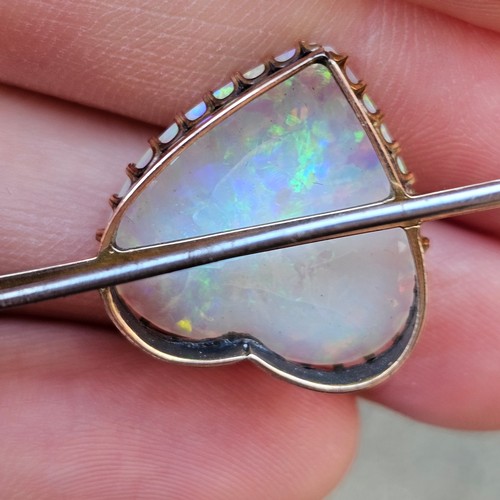 1100 - A large Antique 9ct rose gold opal 'Heart and Arrow' brooch, maker G&SA, set with heart cabochon whi... 