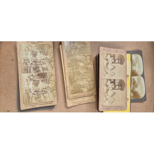 188 - A collection of Vintage stereoscopic cards, together with 2 stereoscopes