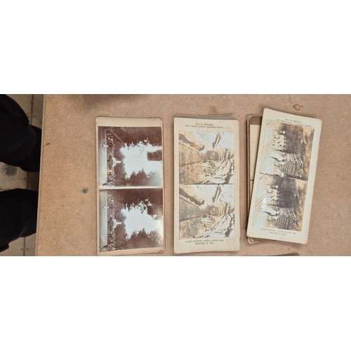 188 - A collection of Vintage stereoscopic cards, together with 2 stereoscopes