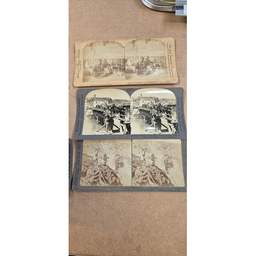 188 - A collection of Vintage stereoscopic cards, together with 2 stereoscopes