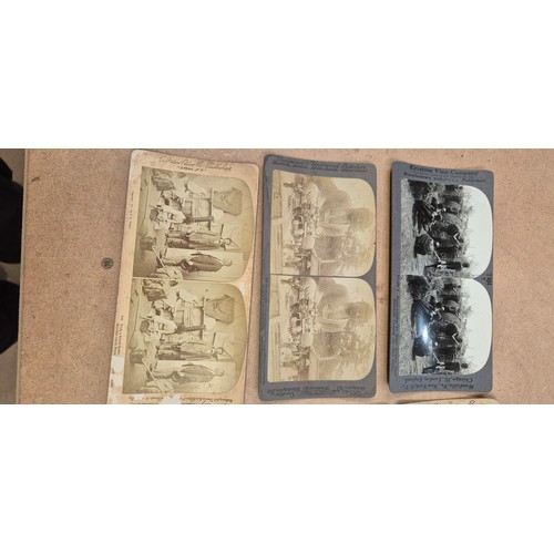 188 - A collection of Vintage stereoscopic cards, together with 2 stereoscopes