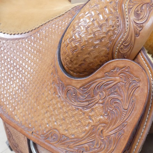 70 - A stunning handmade leather Western horse saddle, with detailed hand carved and stamped decoration, ... 