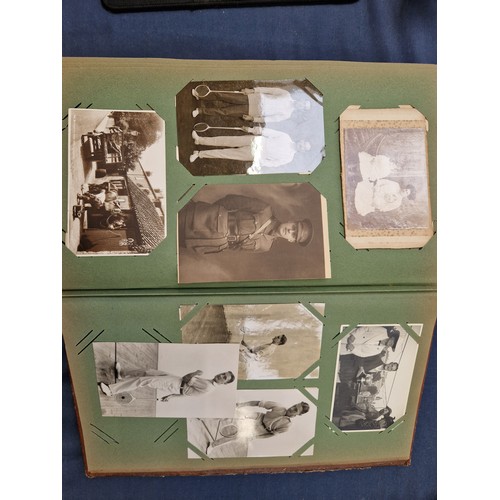 165 - A mixed album of Vintage postcards, including military, family, topographical and greetings cards