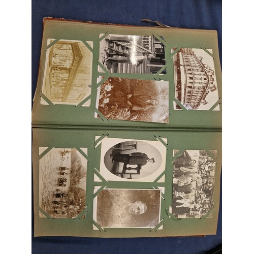 165 - A mixed album of Vintage postcards, including military, family, topographical and greetings cards