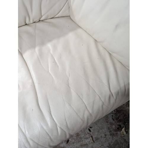 2663 - LIGNE ROSET - A contemporary white leather upholstered two-seater sofa. Overall width 145cm, height ... 