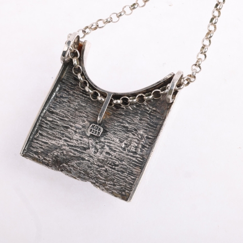 1622 - KNUD JORGENSEN RANDERS - a Danish brutalist oxidised sterling silver abstract pendant necklace, on s... 