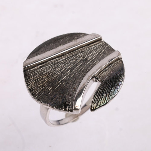 1641 - A modern oxidised sterling silver abstract panel ring, setting height 26mm, size Q, 9.5g