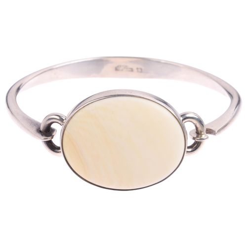 1644 - NIELS ERIK FROM - a Danish modernist sterling silver and marine ivory torque bangle, setting height ... 