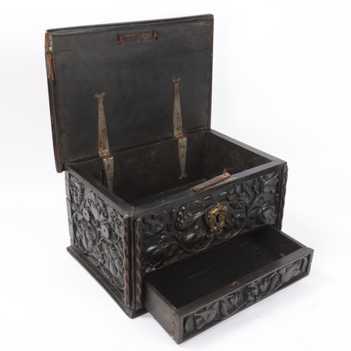 14 - An early 19th century Sri Lankan ebony box, circa 1830, relief carved allover with hinged lid and dr... 