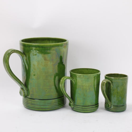 30 - Rye Pottery, 3 graduated green glaze tankards, inscribed model of mermaid tankard Rye 1926, with rel... 