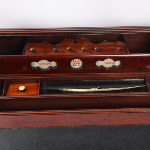 34 - A 19th century mahogany campaign writing slope, with tambour compartment and recessed brass handle, ... 