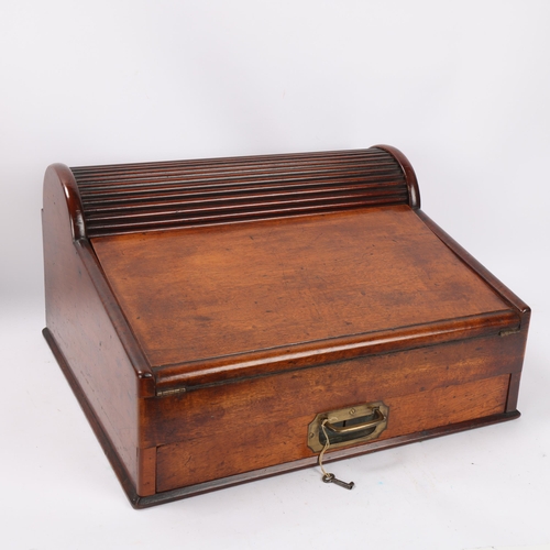 34 - A 19th century mahogany campaign writing slope, with tambour compartment and recessed brass handle, ... 