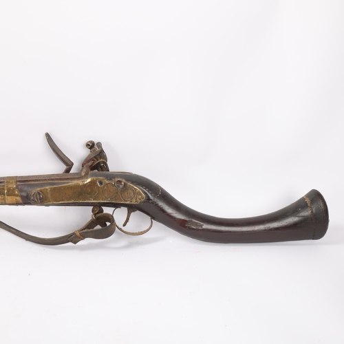 36 - Antique Indian flintlock rifle, overall length 126cm