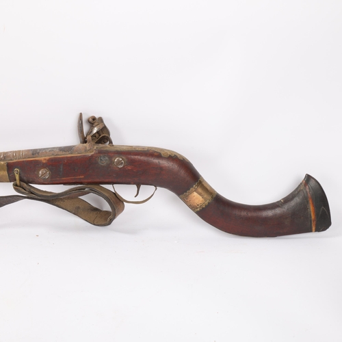 37 - Antique Indian flintlock rifle, overall length 128cm