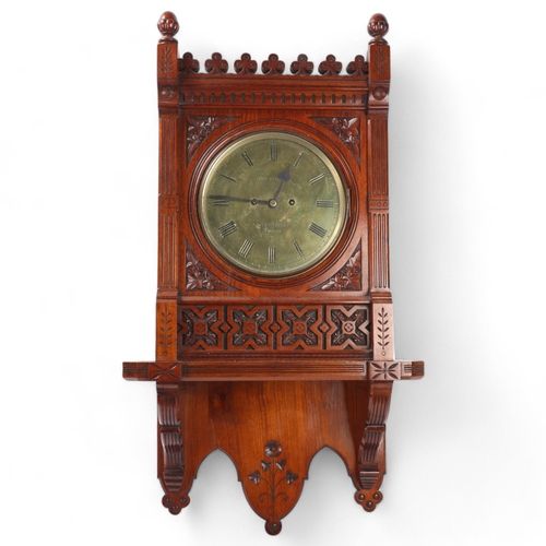 45 - An impressive Victorian Gothic carved walnut-cased wall clock, by John Bennett  of Cheapside London,... 