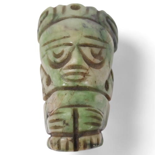 53 - A pre-Colombian 12th century green hardstone amulet in the form of a seated figure, height 4cm