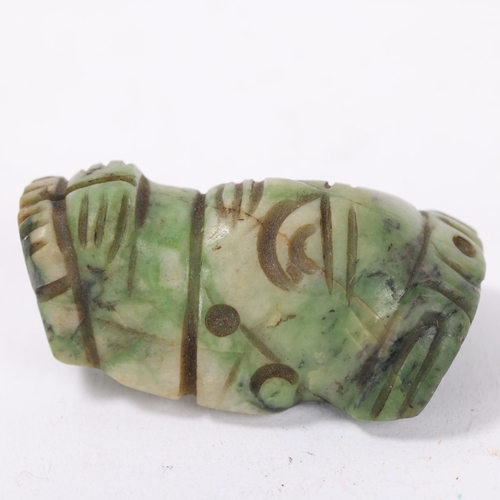 53 - A pre-Colombian 12th century green hardstone amulet in the form of a seated figure, height 4cm