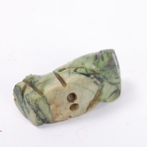 53 - A pre-Colombian 12th century green hardstone amulet in the form of a seated figure, height 4cm