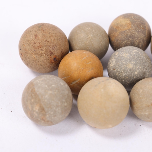 55 - 10 ancient Roman clay marbles or gaming counters