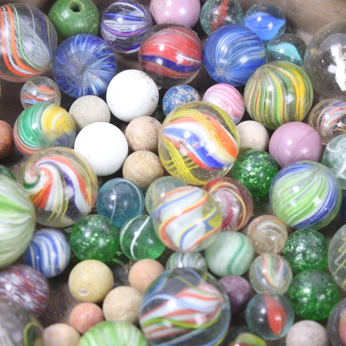 56 - A collection of mainly 19th century glass marbles