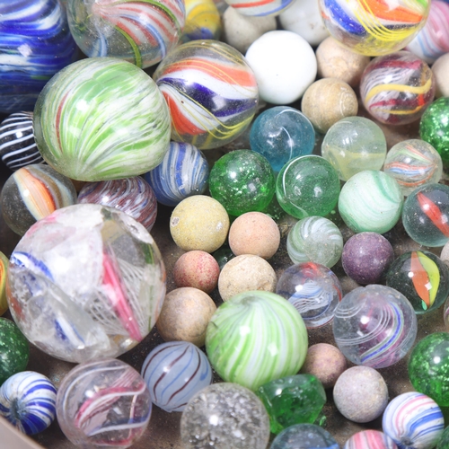 56 - A collection of mainly 19th century glass marbles