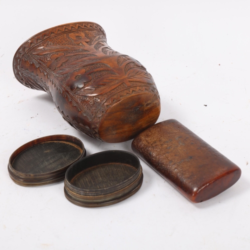 104 - A 19th century treen snuffbox, length 7.5cm, an oval horn snuffbox, and a relief carved wood vase (3... 