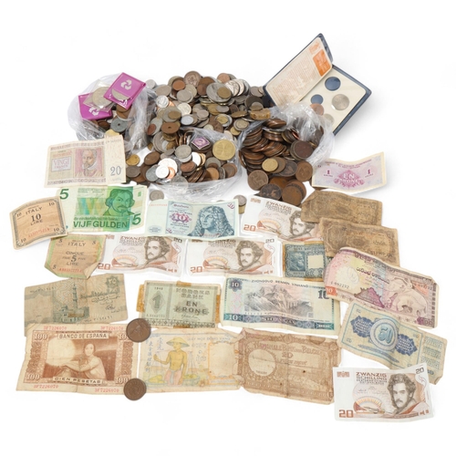 114 - A large collection of British and Foreign coins and banknotes, including Victorian Bun pennies, comm... 