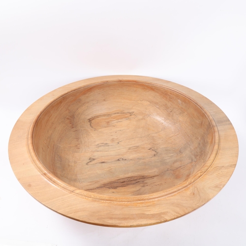 123 - A large spalted turned wood table centre bowl, diameter 63cm, height 18cm