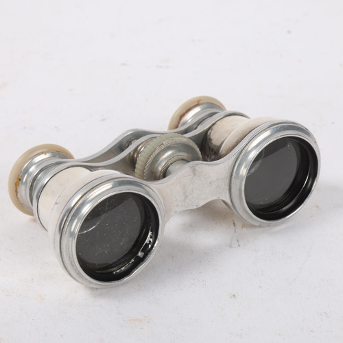 132 - Pair of French silver opera glasses, with mother-of-pearl eyepieces, circa 1920s, French hallmarks