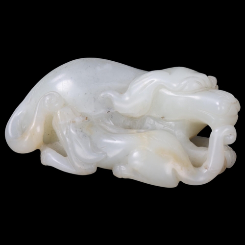 148 - A Chinese relief carved jade buffalo and calf, Qing Dynasty, length 7cm