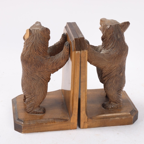 161 - Pair of Black Forest carved wood standing bear design bookends, height 16cm