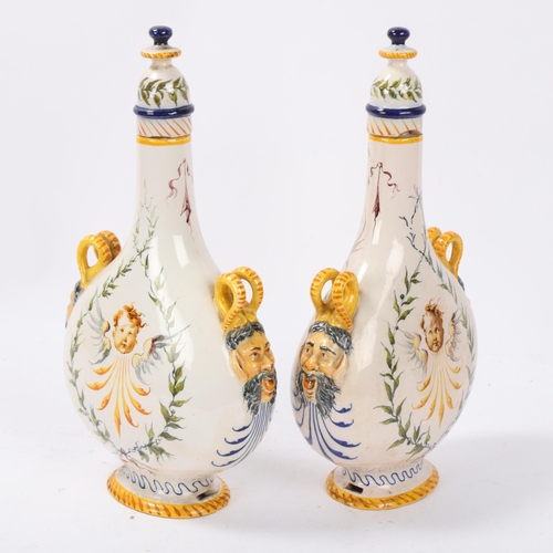 81 - Pair of Ginori late 19th century Italian Maiolica pilgrim flasks, each with satyr masks to the shoul... 