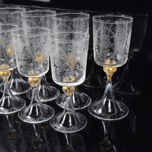 83 - 2 sets of 6 Venetian wine glasses, each with engraved bowls, gilt knopped stem and trumpet foot, tal... 