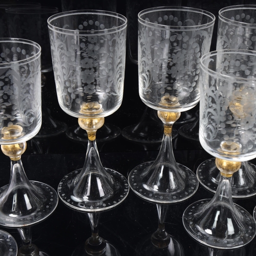 83 - 2 sets of 6 Venetian wine glasses, each with engraved bowls, gilt knopped stem and trumpet foot, tal... 