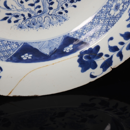 87 - Large Chinese 18th century blue and white porcelain bowl, with painted flowers, diameter 39.5cm (A/F... 