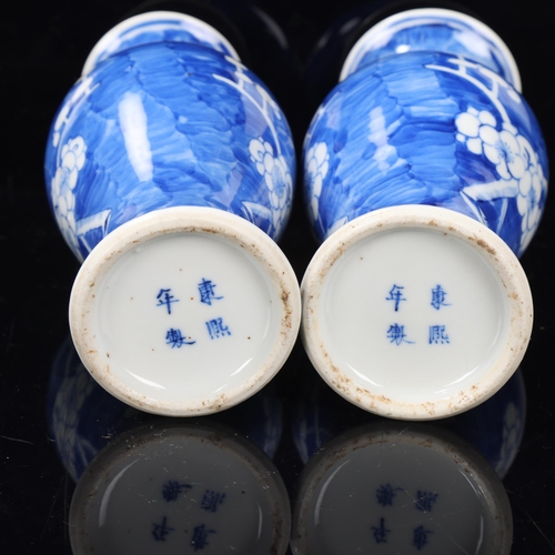 97 - Pair of Chinese blue and white porcelain prunus design baluster vases, 4 character marks, height 20c... 