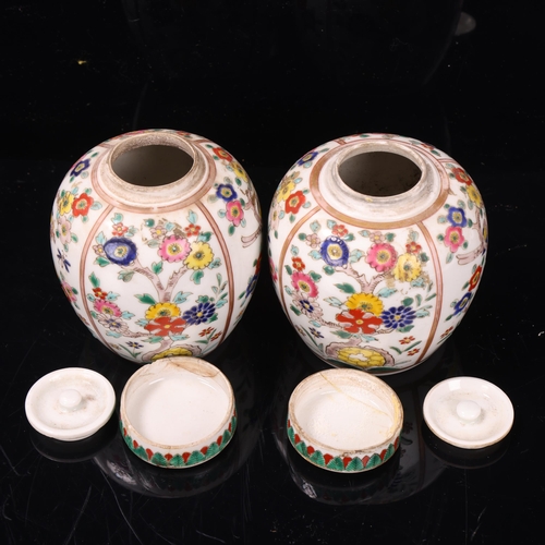 98 - Pair of 19th century porcelain jars and covers, with enamelled birds and flowers, height 10.5cm