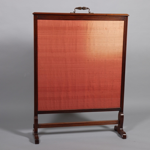 99 - A large 19th century Arts and Crafts walnut framed fire screen, with original embroidered panel in t... 